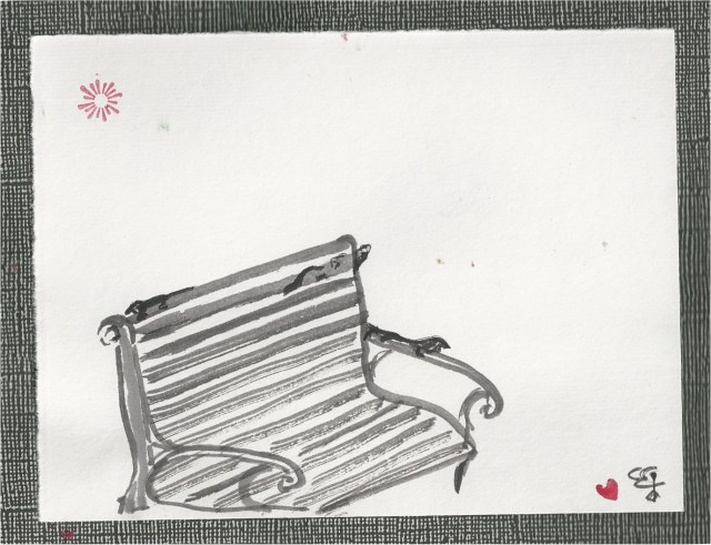 lizards on a park bench