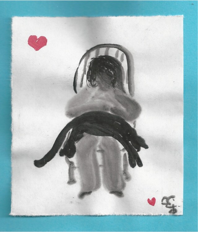 human w blk cat drapped on lap