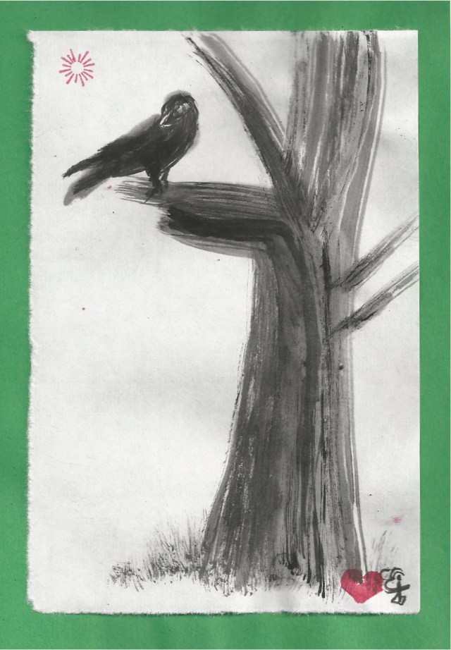 crow on dead tree