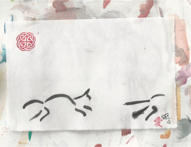 cat chasing cat on blotter