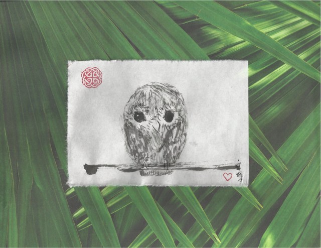 owl on palm leaves