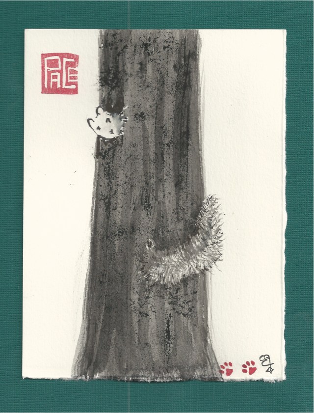 two squirrels around one tree