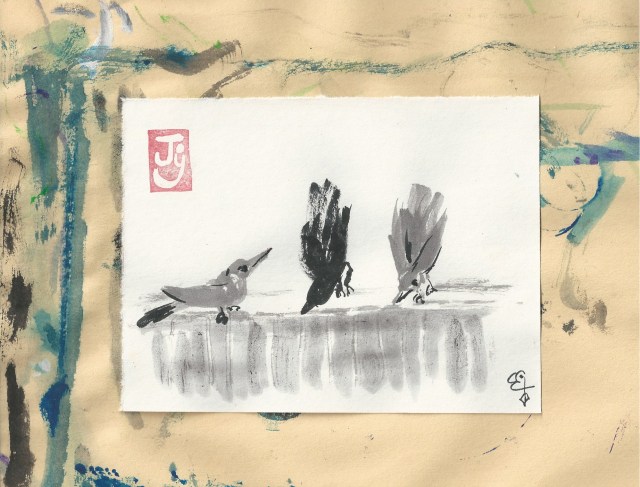 three birds on a fence