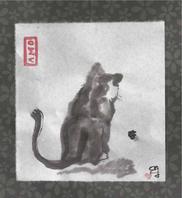 calico facinated with thing on floor