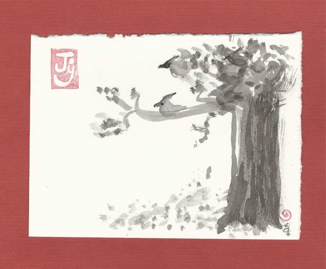 carninals in the cherry tree